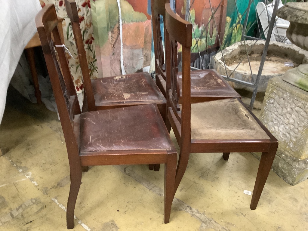 A set of four Edwardian satinwood banded lyre back dining chairs